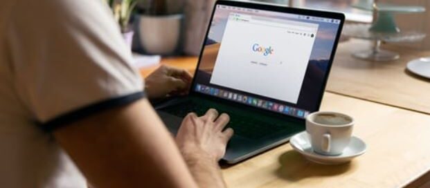 Person using the Google Search Engine.