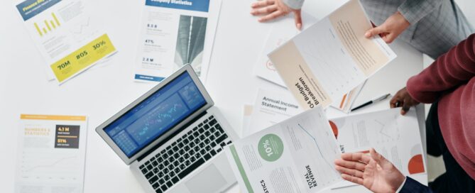 A group of employees conducting sales analysis