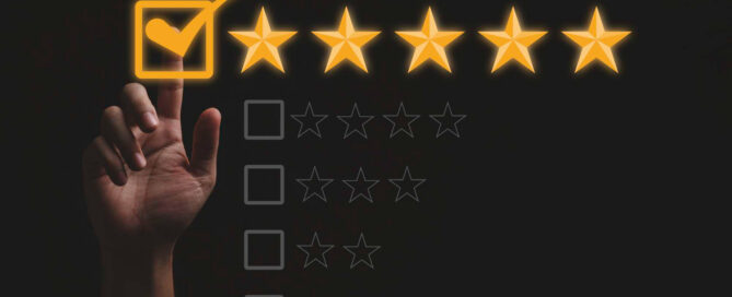 Index finger checks a box next to a row of five golden stars